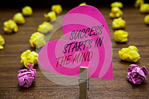 Text sign showing Success Starts In The Mind. Conceptual photo Have positive thoughts accomplish what you want Paperclip hold pink