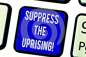 Text sign showing Suppress The Uprising. Conceptual photo Invading and taking control by force To put an end Keyboard