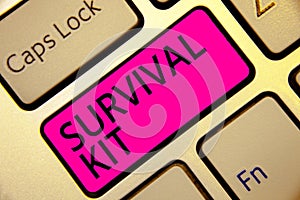 Text sign showing Survival Kit. Conceptual photo Emergency Equipment Collection of items to help someone Keyboard pink key Intenti