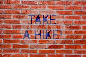 Text sign showing Take A Hike. Conceptual photo Go on an adventure activity backpacking living in nature Brick Wall art