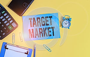 Text sign showing Target Market. Conceptual photo Particular group of consumers which a product is aimed Clipboard clips sheet