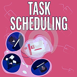 Text sign showing Task Scheduling. Business concept The assignment of start and end times to a set of tasks Colleagues