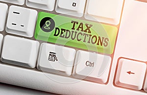Text sign showing Tax Deductions. Conceptual photo an amount or cost that subtracted from someone s is income Different
