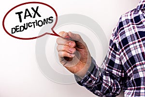 Text sign showing Tax Deductions. Conceptual photo Reduction on taxes Investment Savings Money Returns Text white background man h