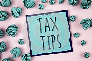 Text sign showing Tax Tips. Conceptual photo Help Ideas for taxation Increasing Earnings Reduction on expenses Concept For Informa photo