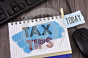 Text sign showing Tax Tips. Conceptual photo Help Ideas for taxation Increasing Earnings Reduction on expenses Concept For Informa photo