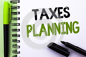 Text sign showing Taxes Planning. Conceptual photo Financial Planification Taxation Business Payments Prepared written on Notebook