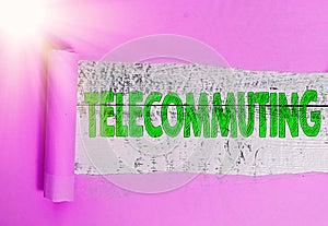 Text sign showing Telecommuting. Conceptual photo work at home using an electronic linkup with central office Rolled