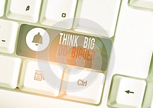 Text sign showing Think Big Do Bigger. Conceptual photo Raise the Bar and Aim far Higher than the Usual White pc