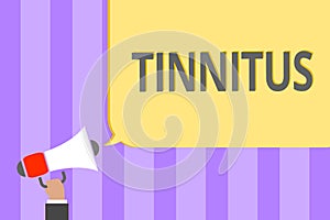 Text sign showing Tinnitus. Conceptual photo A ringing or music and similar sensation of sound in ears Megaphone loudspeaker loud