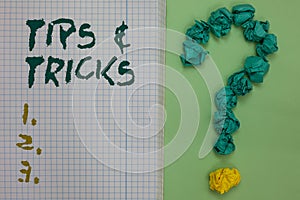 Text sign showing Tips and Tricks. Conceptual photo Steps Lifehacks Handy advice Recommendations Skills Notebook paper photo