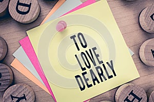 Text sign showing To Love Dearly. Conceptual photo Love someone very much in the more humble way and aimlessly