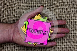 Text sign showing Training Motivational Call. Conceptual photo Organized activity to develop skill set of people Holding small pit