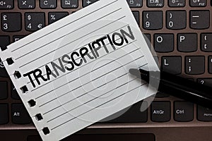 Text sign showing Transcription. Conceptual photo Written or printed version of something Hard copy of audio Notebook piece paper