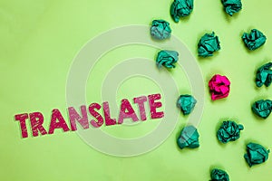 Text sign showing Translate. Conceptual photo Another word with same equivalent meaning of a target language Crumpled wrinkled pap photo