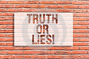 Text sign showing Truth Or Lies. Conceptual photo Decide between a fact or telling a lie Doubt confusion Brick Wall art photo