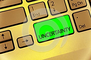 Text sign showing Uncertainty. Conceptual photo Unpredictability of certain situations events behavior Keyboard key laptop creativ