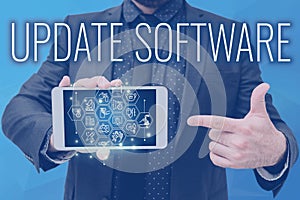 Text sign showing Update Software. Business approach replacing program with a newer version of same product Man holding