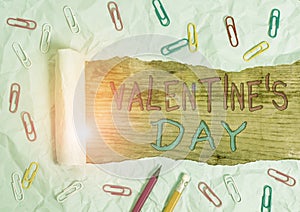 Text sign showing Valentine S Day. Conceptual photo roanalysistic holiday celebrated each year on February 14 Stationary and torn photo