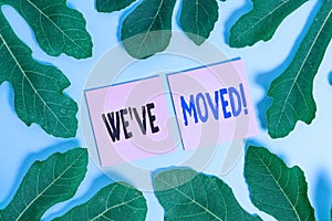 Text sign showing We Ve Moved. Conceptual photo To go from one residence or location to another Relocate Leaves