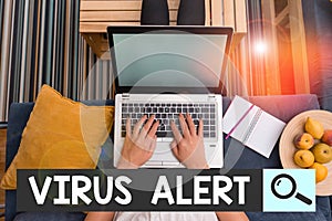 Text sign showing Virus Alert. Conceptual photo message warning of a nonexistent computer virus threat woman laptop