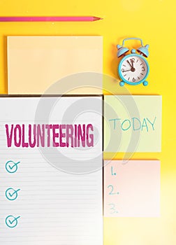 Text sign showing Volunteering. Conceptual photo an individual who voluntarily expresses a willingness to undertake