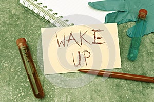 Text sign showing Wake Up. Business showcase an instance of a person waking up or being woken up Rise up Writing