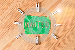 Text sign showing Wanted. Conceptual photo Desire something Wish want Hoping for Somebody being searched Colored clothespin papers