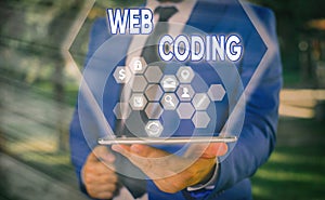 Text sign showing Web Coding. Conceptual photo work involved in developing a web site for the Internet.