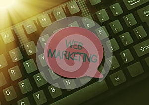 Text sign showing Web Marketing. Business concept Electronic commerce Advertising through internet Online seller