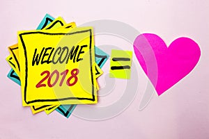 Text sign showing Welcome 2018. Conceptual photo Celebration New Celebrate Future Wishes Gratifying Wish written on Yellow Sticky photo