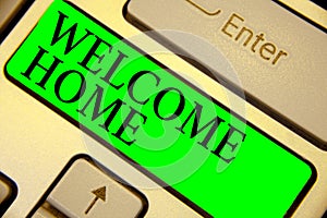 Text sign showing Welcome Home. Conceptual photo Expression Greetings New Owners Domicile Doormat Entry Keyboard green key Intenti photo