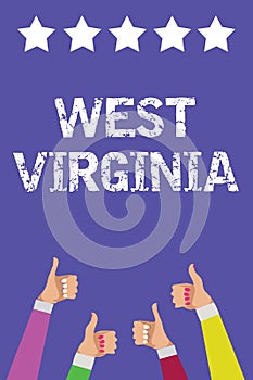 Text sign showing West Virginia. Conceptual photo United States of America State Travel Tourism Trip Historical Men women hands th