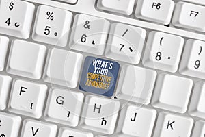 Text sign showing What S Your Competitive Advantage Question. Conceptual photo Marketing strategy Plan White pc keyboard