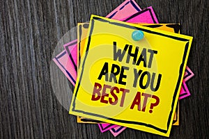 Text sign showing What Are You Best At Question. Conceptual photo Individual creativity is a unique capability Wooden background i