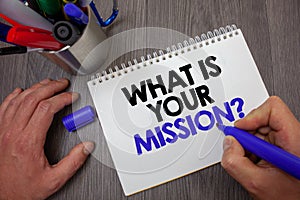 Text sign showing What Is Your Mission Question. Conceptual photo Positive goal focusing on achieving success Man hold holding blu