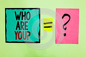 Text sign showing Who Are You question. Conceptual photo Identify yourself description personal characteristics Black lined writte