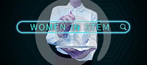 Text sign showing Women In Stem. Business approach Science Technology Engineering Mathematics Scientist Research