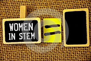 Text sign showing Women In Stem. Conceptual photos Science Technology Engineering Mathematics Scientist Research