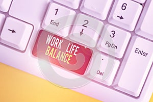 Text sign showing Work Life Balance. Conceptual photo Division of time between working or family and leisure White pc