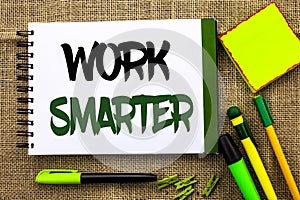 Text sign showing Work Smarter. Conceptual photo Efficient Intelligent Job Task Effective Faster Method written on Notebook Book o