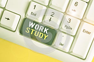Text sign showing Work Study. Conceptual photo college program that enables students to work parttime White pc keyboard photo