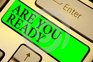 Text sign showing Are You Ready. Conceptual photo Alertness Preparedness Urgency Game Start Hurry Wide awake Keyboard green key In