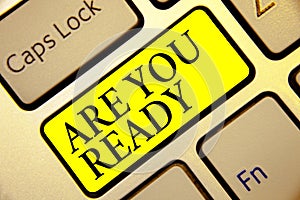 Text sign showing Are You Ready. Conceptual photo Alertness Preparedness Urgency Game Start Hurry Wide awake Keyboard yellow key I