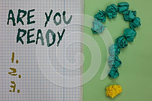 Text sign showing Are You Ready. Conceptual photo Alertness Preparedness Urgency Game Start Hurry Wide awake Notebook paper crumpl