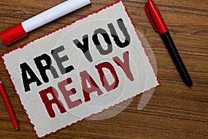 Text sign showing Are You Ready. Conceptual photo Alertness Preparedness Urgency Game Start Hurry Wide awake White paper red borde