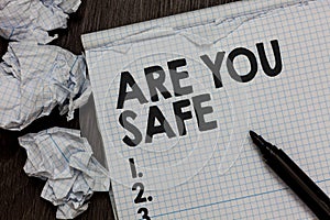 Text sign showing Are You Safe. Conceptual photo Free from danger Not anticipating any Harm Hurt physically Marker over notebook c
