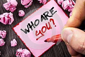 Text sign Who Are You Question. Business concept for Personality Identity Profile, About Me Or You written Pin Sticky Note Paper