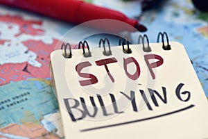 Text stop bullying in a notebook photo