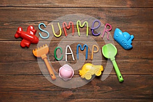 Text SUMMER CAMP made of modelling clay and different sand molds